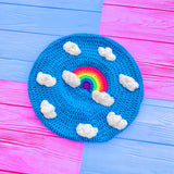 Neon Rainbow Cloud Beret - Bright blue crochet beret with white cloud and neon rainbow design by VelvetVolcano