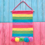 Pastel Rainbow Striped Crochet Pin Display Banner with Pastel Rainbow Pom Poms and Birch Wooden Dowel Hanger by VelvetVolcano