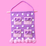 Lilac Polka Dot Crochet Wall Hanging with Baby Pink Bow Pockets and Pastel Pink Pom Pom Trim - Girly Kawaii Organiser Home Decor by VelvetVolcano