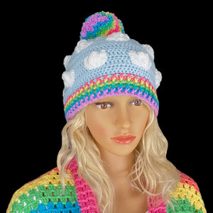 Kawaii Duck Egg Blue Crochet Beanie with White Cloud Pattern, Pastel Rainbow Pom Pom and Pastel Rainbow Ribbed Brim by VelvetVolcano