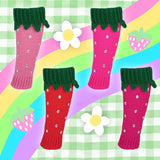 Multiple colour options of the VelvetVolcano Strawberry Leg Warmers all with Emerald green top cuff and leaf detail, the main colours are Bubblegum, Neon Pink, Rose Red and Cerise.