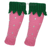 Bubblegum pink crochet leg warmers designed to look like strawberries with emerald green top cuffs that feature little green leaves and silver rhinestone seeds by VelvetVolcano