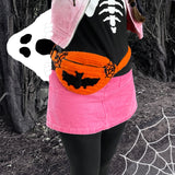 A photo of Tamsyn wearing a white and pink ombre biker jacket, a black sweater with white skeleton rib print, a pink corduroy mini skirt, black leggings, silver Dr Martens boots and an orange Creature Feature Bum Bag by VelvetVolcano. The background is a spooky looking wooded area. Tamsyn's head is out of frame but her brown hair can be seen in plaits.
