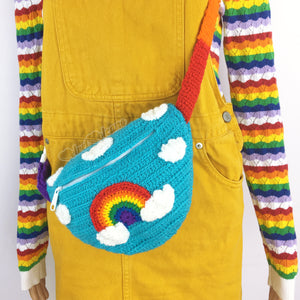 Colourful Rainbow Cloud Crochet Bum Bag - Turquoise Fanny Pack with repeating cloud print, rainbow cloud motif and rainbow striped strap/belt by VelvetVolcano