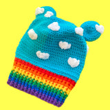 Kawaii Turquoise Crochet Bear Balaclava with White Cloud Details, Round Bear Ears and a Rainbow Striped Ribbed Neck Section by VelvetVolcano