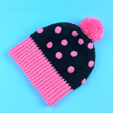 Black and Bubblegum Pink spotted crochet bobble hat. Super Slouchy Polka Dot Pom Pom Beanie (Custom Colour) by VelvetVolcano