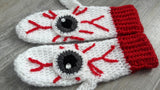 White crochet mittens with red cuffs and eyeball design including red blood vessels. Eye See You Mittens by VelvetVolcano