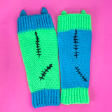 Frankenstein's Monster inspired Neon Green, Turquoise, Neon Pink and Black crochet leg warmers with contrasting design, cat ear and black stitch details. VelvetVolcano FrankenKitty Leg Warmers