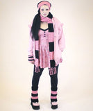 Toxic Tears aka Kaya wearing a Baby Pink & Black outfit, featuring VelvetVolcano Chunky Bubblegum Pink & Black Striped Scarf, matching fingerless gloves and matching striped flared leg warmers.