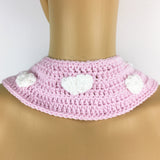 Baby Pink crochet Peter Pan style detachable collar with tie closure, repeating white cloud pattern and pastel rainbow with a cloud at the end motif of each lapel. Pastel Rainbow Cloud Collar (Baby Pink) by VelvetVolcano