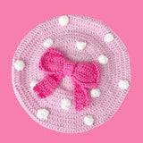 Baby Pink crocheted beret with White polka dots and a large Bubblegum Pink bow in the centre by VelvetVolcano
