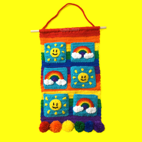 Sunshine & Rainbows Hanging Organiser - Colourful Rainbow Striped Crochet Wall Art with Sun and Rainbow Cloud Pockets and Pom Pom Trim by VelvetVolcano