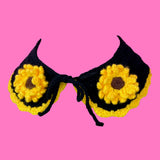 Black crocheted Peter Pan collar with yellow scallop trim and crochet sunflower appliques on each lapel.