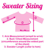 VelvetVolcano Sweater Sizing Graphic showing a light pink long sleeved top with 3 arrows marking measurements. There is text that says "1. Arm Measurement (armpit to wrist), 2. Bust/Chest Measurement (circumference around the widest part of the chest), 3. Sweater Length (collar to hem)"