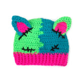 Half neon green, half turquoise crochet beanie with cat ears (which are neon pink inside) and a neon pink ribbed brim, designed to look like a Frankenstein's Monster Kitty. Custom Colour FrankenKitty Beanie by VelvetVolcano