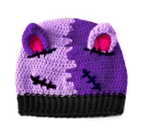 Half lilac and half violet zombie and Frankenstein's Monster inspired cat ear crochet beanie with hot pink inner ears and black rib at the bottom of the hat- NecroKitty Beanie by VelvetVolcano