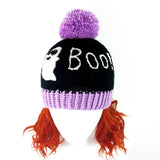 Black crochet bobble hat with white smiley ghost and white BOO! lettering and lilac pom pom and ribbed brim. BOO! Ghost Custom Colour Pom Pom Beanie by VelvetVolcano