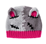 Half light grey, dark grey crochet beanie with cat ears (which are hot pink inside) and a hot pink ribbed brim, designed to look like a Frankenstein's Monster Kitty. Custom Colour FrankenKitty Beanie by VelvetVolcano