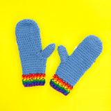 Grey blue crochet mittens with rainbows striped cuffs and rainbow and cloud motifs by VelvetVolcano