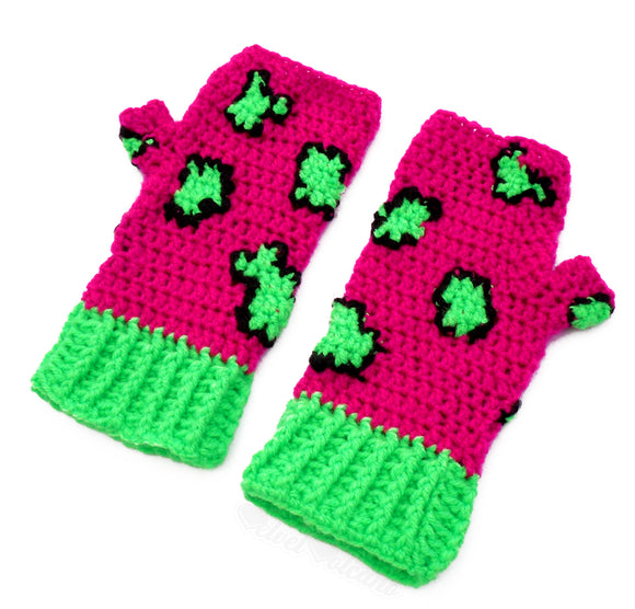 Neon pink crochet hand warmers with black and neon green leopard print design and neon green cuffs. Leopard Fingerless Gloves (Custom Colour) by VelvetVolcano