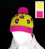 Neon yellow crochet hat with black and neon pink leopard print, neon pink pom pom and neon pink bottom rib. Leopard Pom Pom Beanie (Custom Colour) by VelvetVolcano