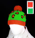 Neon green crochet hat with black and neon orange leopard print, neon orange pom pom and neon orange bottom rib. Leopard Pom Pom Beanie (Custom Colour) by VelvetVolcano