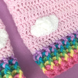 Close up of Kawaii, Fairy Kei, Cute Baby Pink Crochet Leg Warmers with White Cloud Pattern and Pastel Rainbow Striped Cuffs (Bubblegum Pink, Daffodil Yellow, Spearmint Green, Turquoise and Lilac) by VelvetVolcano