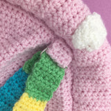 Close up of the strap and D ring that connects to the Pastel Rainbow Cloud Backpack by VelvetVolcano