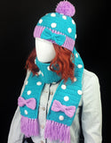 Turquoise crochet scarf with white polka dot pattern, lilac bow and lilac tassels and matching bobble hat. Polka Dot Bow Scarf (Custom Colour) & Polka Dot Bow Pom Pom Beanie by VelvetVolcano
