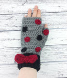 Slate Grey crochet hand warmers with Burgundy and Black polka dot pattern, Black cuffs and a Burgundy bow in the centre of the cuff. Polka Dot Bow Fingerless Gloves (Custom Colour) by VelvetVolcano