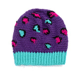 Purple crochet hat with pink, teal and black leopard print detail. Slouchy Leopard Beanie (Custom Colour) by VelvetVolcano