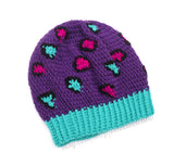 Purple crochet hat with pink, teal and black leopard print detail. Slouchy Leopard Beanie (Custom Colour) by VelvetVolcano