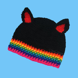 Black crochet cat ear beanie with rainbow ribbed section at the bottom of the hat and red inner ears. Bright Rainbow Rib Kitty Beanie (Custom Colour) by VelvetVolcano