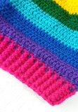 Bright rainbow striped crochet bobble hat with multicoloured pom pom. Bright Rainbow Striped Pom Pom Beanie by VelvetVolcano