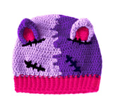 Half lilac and half violet zombie and Frankenstein's Monster inspired cat ear crochet beanie with hot pink inner ears and rib at the bottom of the hat- NecroKitty Beanie by VelvetVolcano